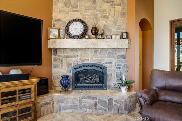 56245 Cobalt Rd, Yucca Valley, CA 92284 - living area with a stone fireplace and arched walkways