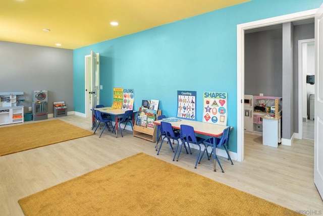 recreation room featuring hardwood / wood-style floors