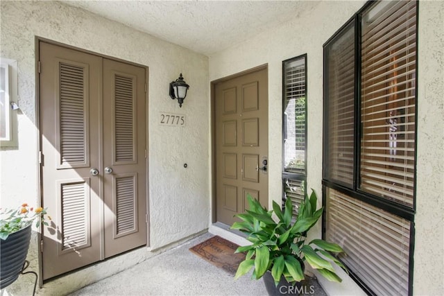 entrance to property with covered porch