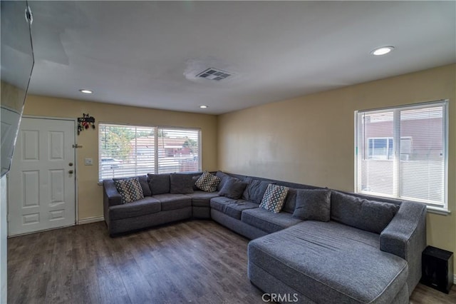 living room featuring dark hardwood / wood-style floors