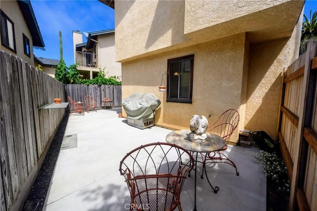 view of patio / terrace featuring a grill