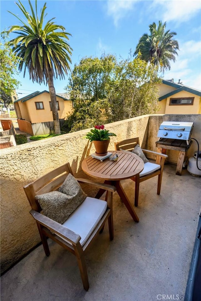 balcony featuring area for grilling