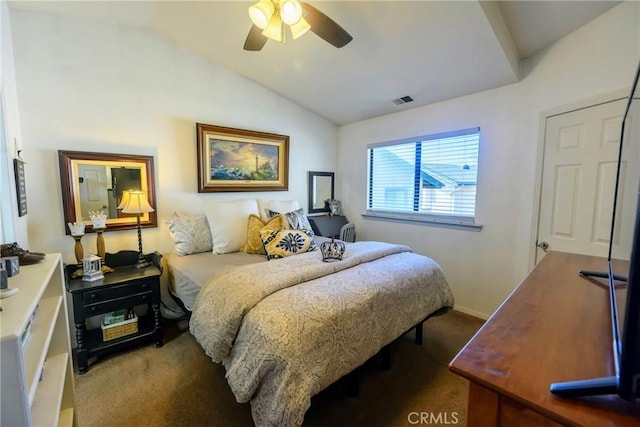 carpeted bedroom with ceiling fan and lofted ceiling