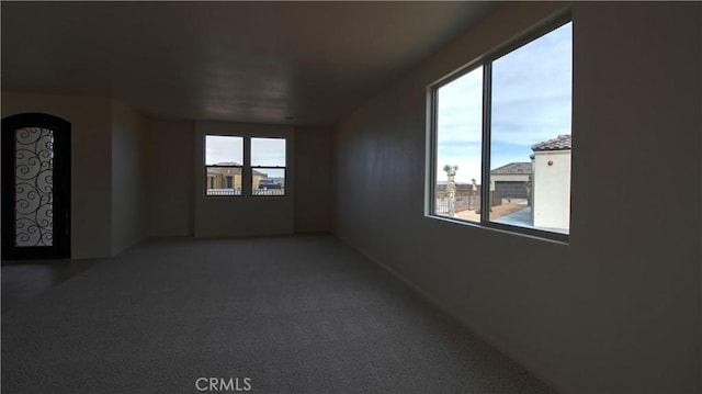 56925 Hidden Gold Ct, Yucca Valley, CA 92284 - carpeted spare room with plenty of natural light