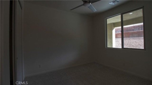 56925 Hidden Gold Ct, Yucca Valley, CA 92284 - empty room with carpet floors and a ceiling fan