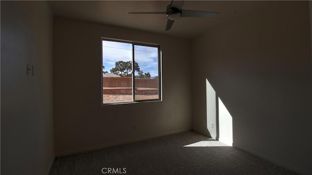 56925 Hidden Gold Ct, Yucca Valley, CA 92284 - spare room with carpet and a ceiling fan