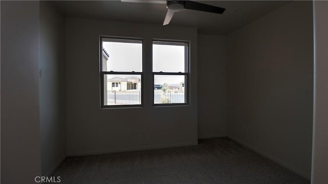 56925 Hidden Gold Ct, Yucca Valley, CA 92284 - spare room featuring plenty of natural light, carpet, and ceiling fan