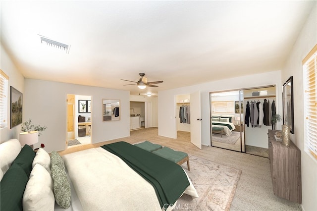 carpeted bedroom with ceiling fan