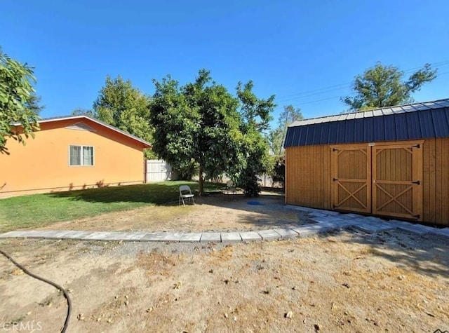 exterior space featuring a storage unit