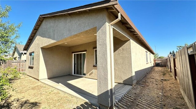 rear view of house with a patio area