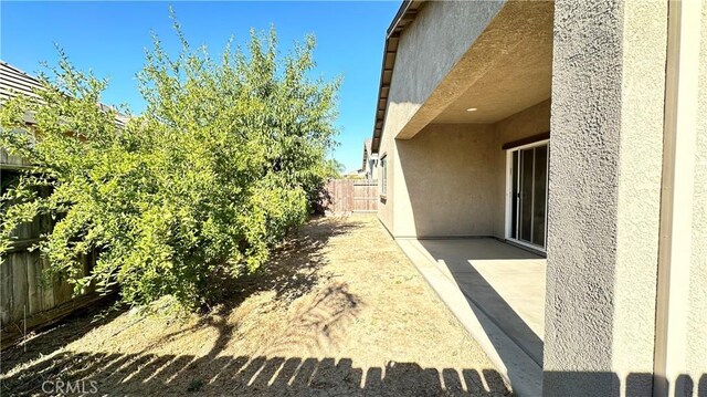 view of yard with a patio area