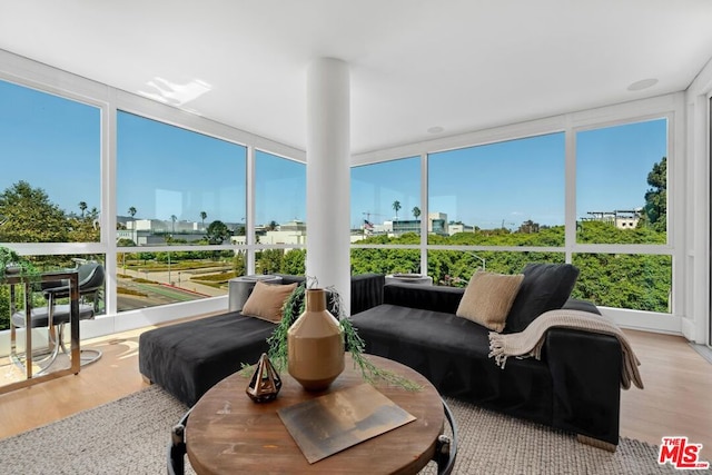 sunroom / solarium featuring plenty of natural light