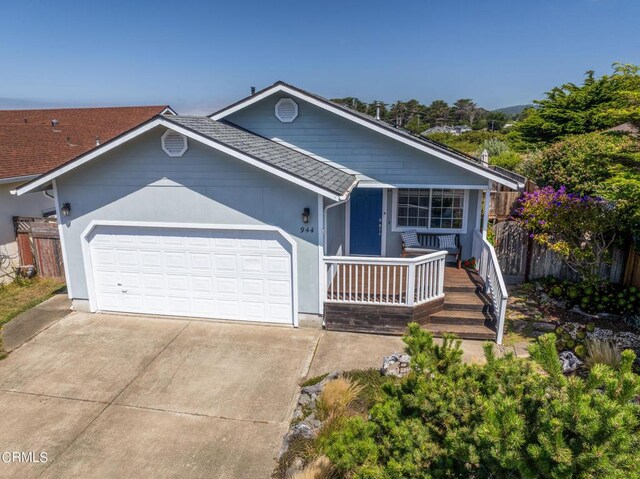 single story home featuring a garage