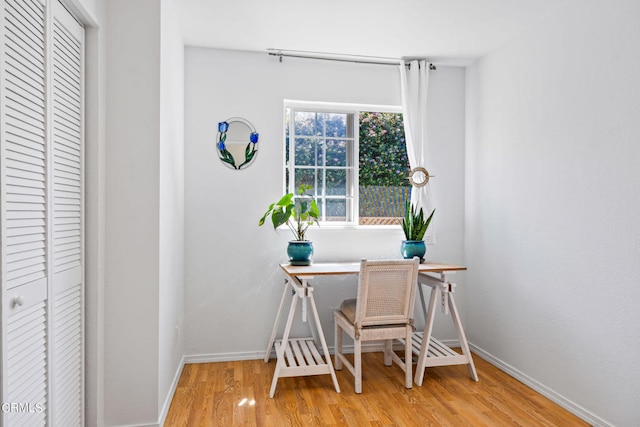 office area with light hardwood / wood-style flooring