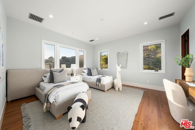 bedroom featuring light wood-type flooring