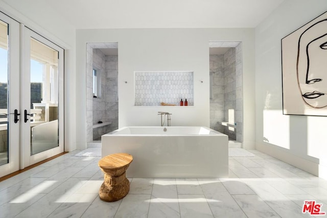 bathroom with independent shower and bath and french doors