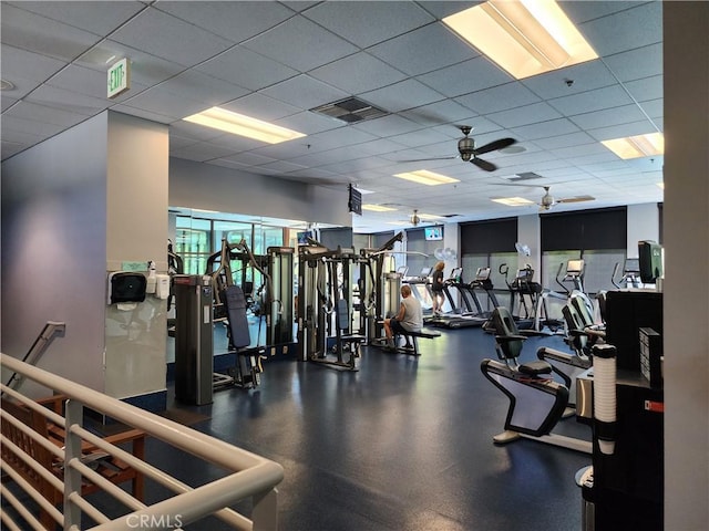 9153 Wooded Hill Dr, Corona, CA 92883 - gym featuring visible vents, a paneled ceiling, and ceiling fan