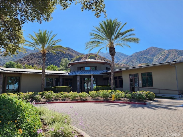 view of front facade featuring a mountain view