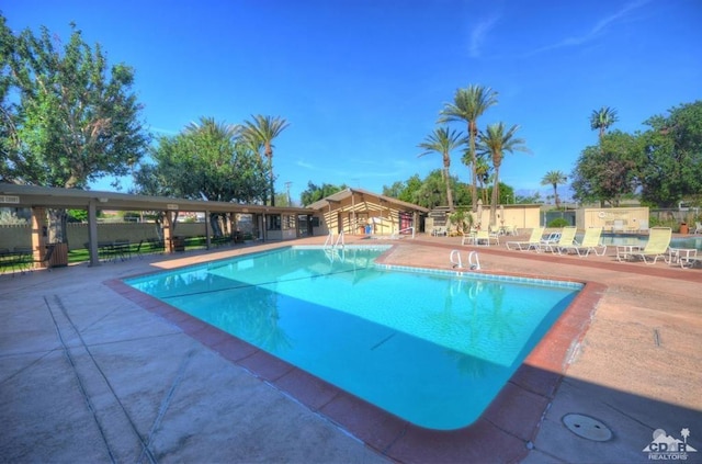 view of pool with a patio area