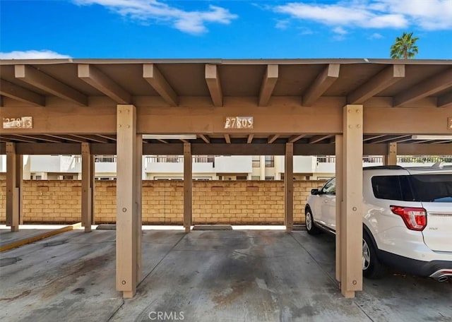 view of car parking with a carport