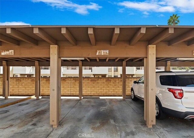 view of car parking with a carport