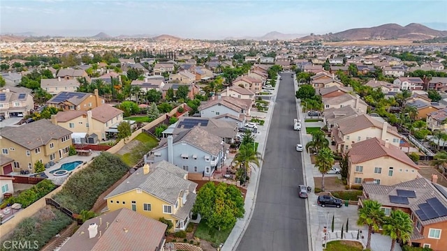 bird's eye view featuring a residential view and a mountain view