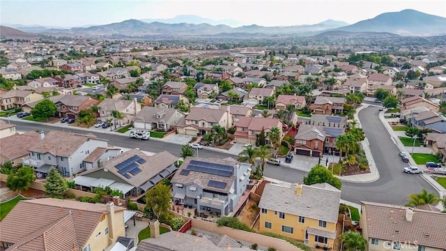 birds eye view of property with a residential view and a mountain view