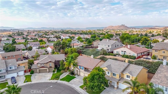 aerial view with a mountain view and a residential view