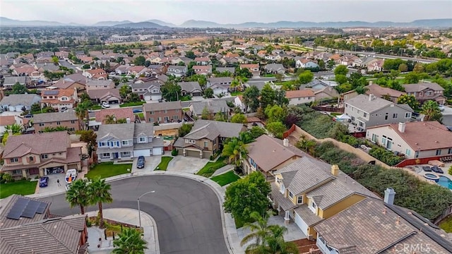 drone / aerial view featuring a mountain view and a residential view