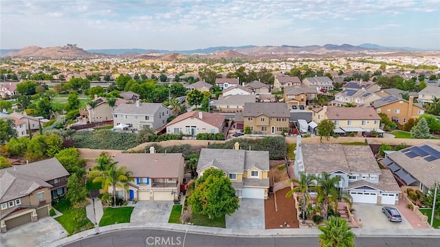 drone / aerial view featuring a mountain view