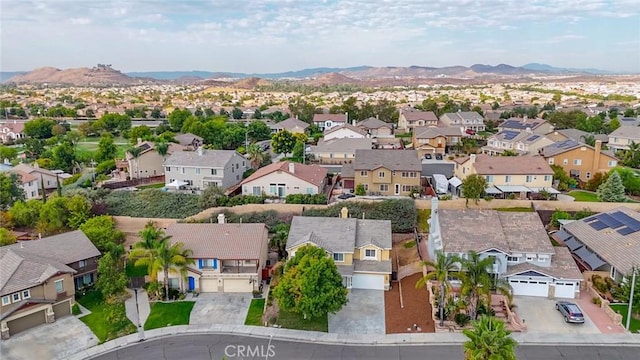 aerial view with a residential view and a mountain view