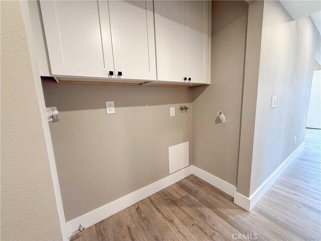 31377 Los Rios St Unit 64F, San Juan Capistrano, CA 92675 - washroom with baseboards and light wood-type flooring