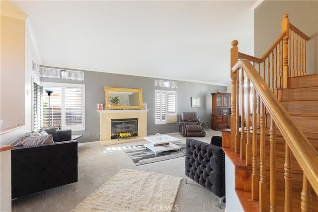 living room with carpet floors and ornamental molding