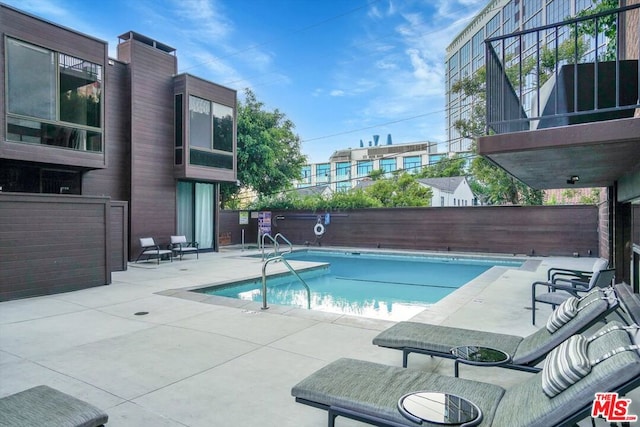 view of pool with a patio area