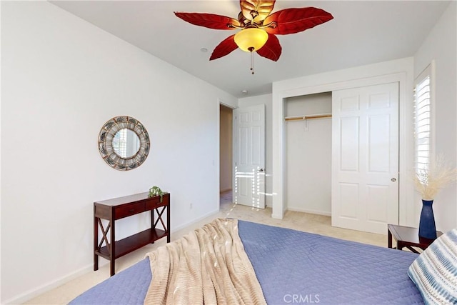 bedroom with a closet and ceiling fan