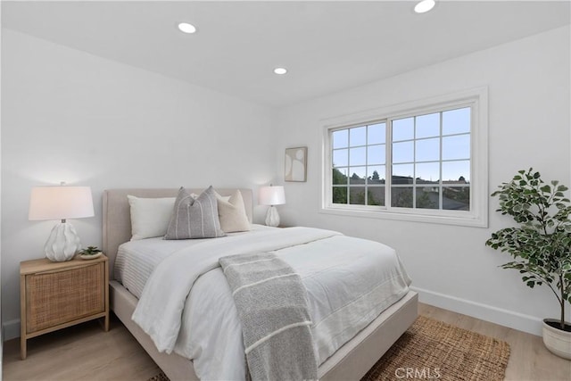 15562 Placid Cir, Huntington Beach, CA 92647 - bedroom featuring recessed lighting, wood finished floors, and baseboards