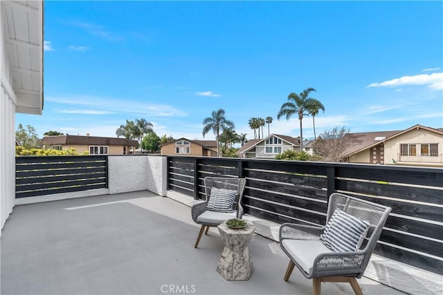 15562 Placid Cir, Huntington Beach, CA 92647 - view of patio featuring a balcony and a residential view
