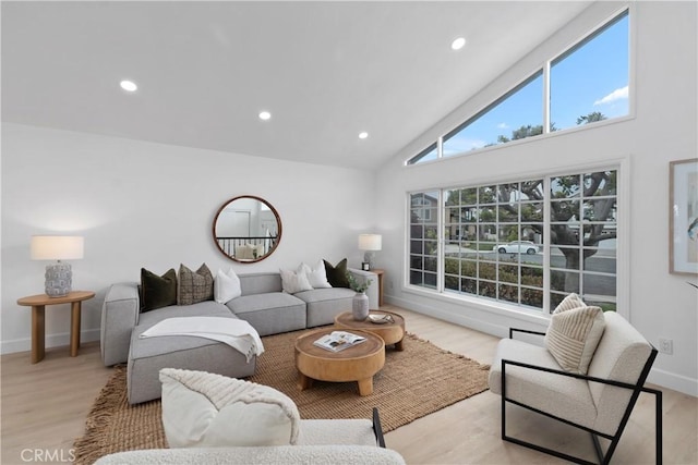 15562 Placid Cir, Huntington Beach, CA 92647 - living room featuring recessed lighting, wood finished floors, baseboards, and high vaulted ceiling