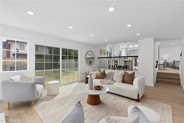 15562 Placid Cir, Huntington Beach, CA 92647 - living area featuring recessed lighting, wood finished floors, and baseboards