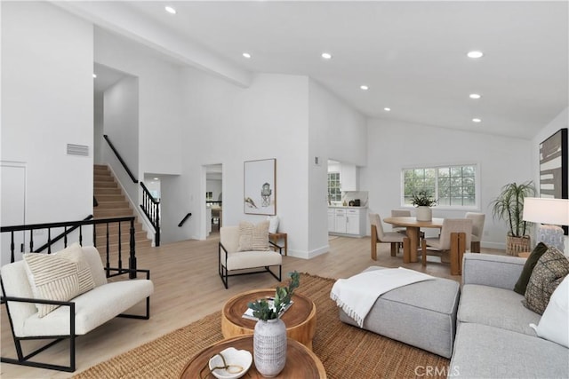 15562 Placid Cir, Huntington Beach, CA 92647 - living area featuring recessed lighting, light wood-style flooring, and stairs