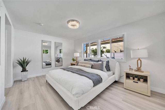 bedroom featuring light wood-type flooring