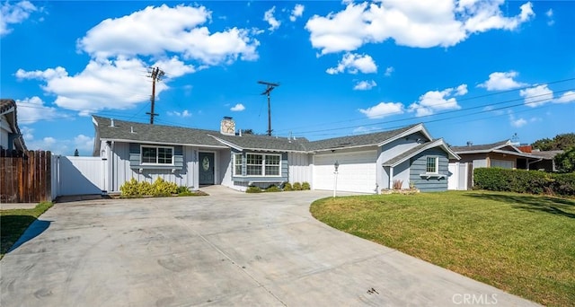 single story home with a front lawn and a garage