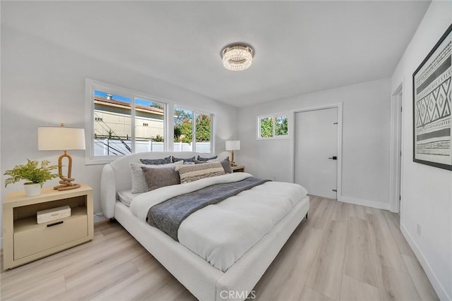 bedroom featuring light wood-type flooring