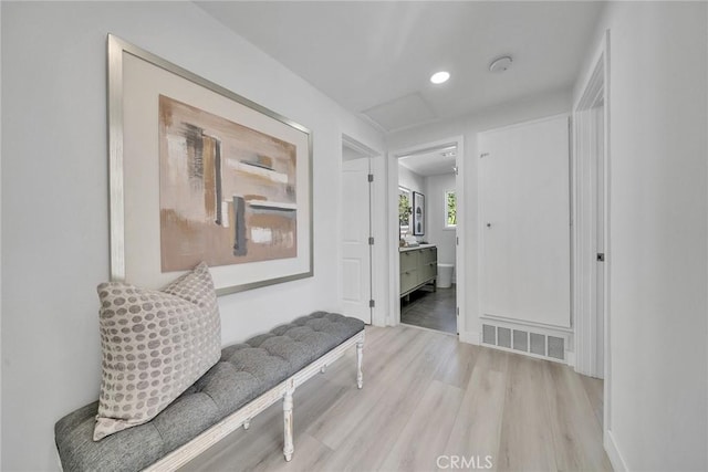 hall featuring light hardwood / wood-style flooring