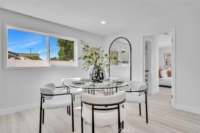 dining room featuring light hardwood / wood-style floors