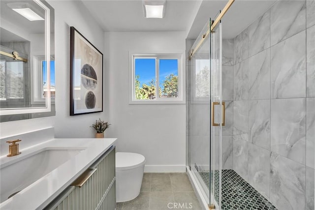 bathroom with tile patterned floors, vanity, toilet, and an enclosed shower