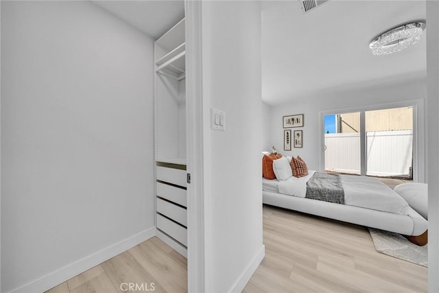 bedroom featuring light hardwood / wood-style floors