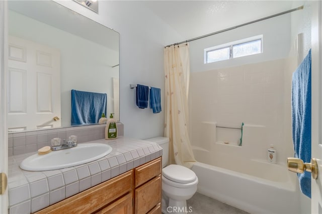 full bathroom with shower / bath combo, vanity, and toilet