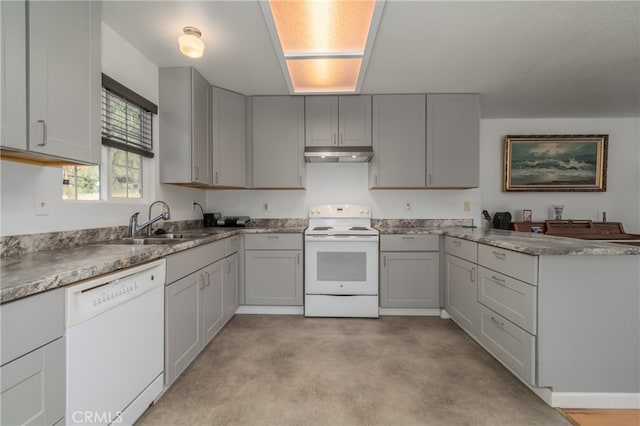 kitchen with gray cabinets, sink, and white appliances