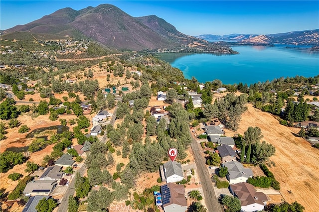 aerial view with a water and mountain view